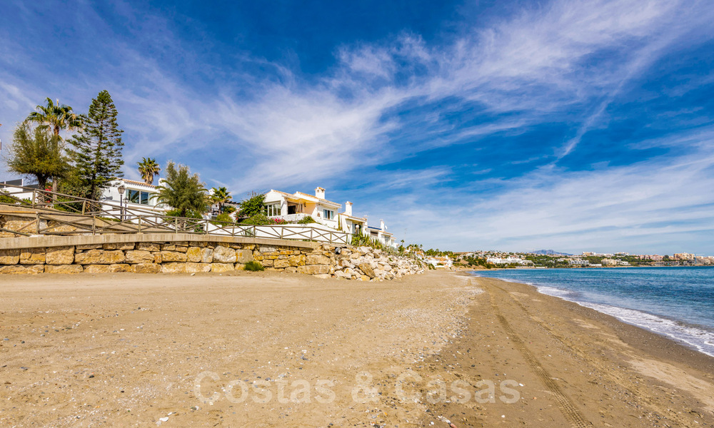 For sale, move-in ready, fully renovated beachfront villa with sea view in Estepona West 28898