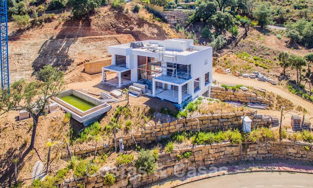 Modern new build villa with panoramic mountain- and sea views for sale in the hills of Marbella East. Under construction. 44284