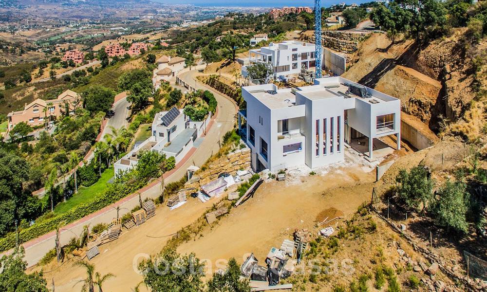 Modern new build villa with panoramic mountain- and sea views for sale in the hills of Marbella East. Under construction. 44286