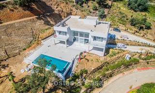 Modern new build villa with panoramic mountain- and sea views for sale in the hills of Marbella East. Almost ready. 57674 