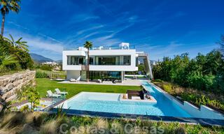 Ready to move in modern villa for sale within walking distance to amenities and Puerto Banus in Nueva Andalucia, Marbella 30702 
