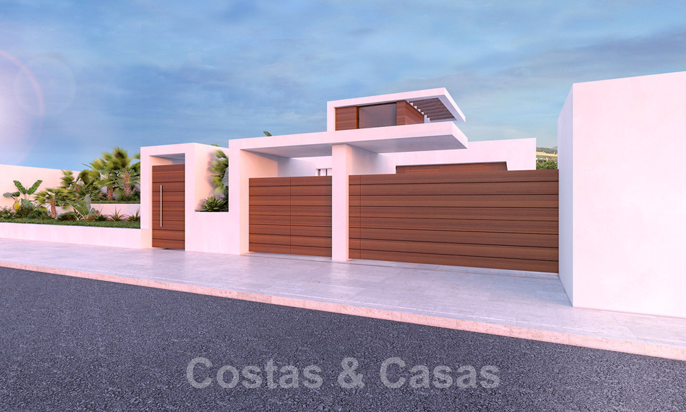 Modern new build villa for sale, directly on the golf course with panoramic golf, mountain and sea views in Estepona 30875