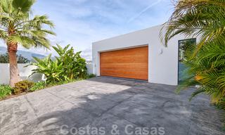 Modern villa for sale, frontline golf with panoramic mountain, golf and sea views in Benahavis - Marbella 31001 