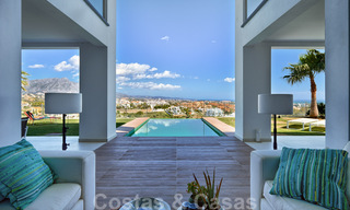 Modern villa for sale, frontline golf with panoramic mountain, golf and sea views in Benahavis - Marbella 31005 
