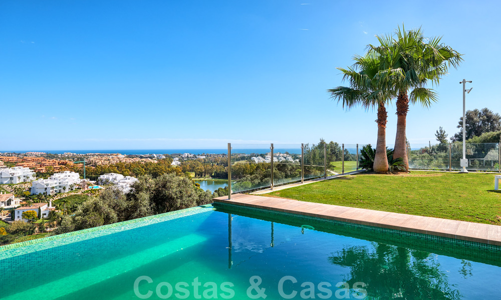 Modern villa for sale, frontline golf with panoramic mountain, golf and sea views in Benahavis - Marbella 31010