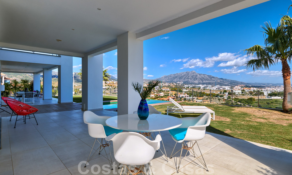 Modern villa for sale, frontline golf with panoramic mountain, golf and sea views in Benahavis - Marbella 31013