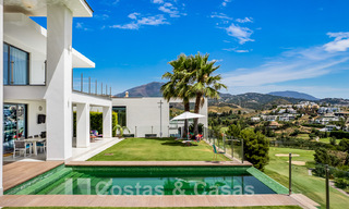 Modern villa for sale, frontline golf with panoramic mountain, golf and sea views in Benahavis - Marbella 42258 