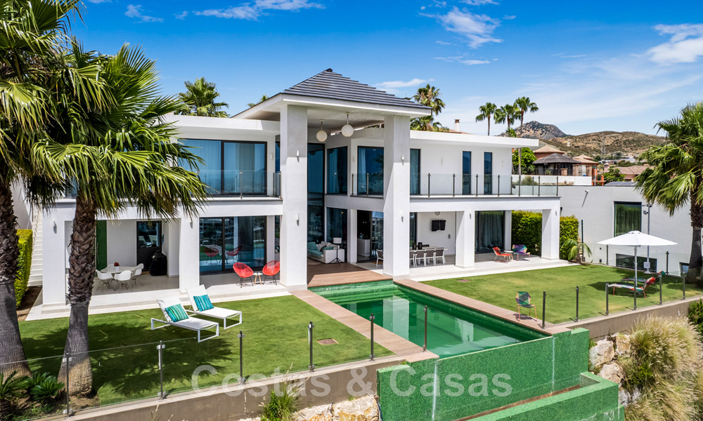 Modern villa for sale, frontline golf with panoramic mountain, golf and sea views in Benahavis - Marbella 42261