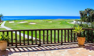 Frontline golf and beach villa for sale in Marbella West with unique golf and sea views! Reduced in price. 31850 