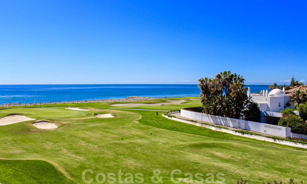 Frontline golf and beach villa for sale in Marbella West with unique golf and sea views! Reduced in price. 31853