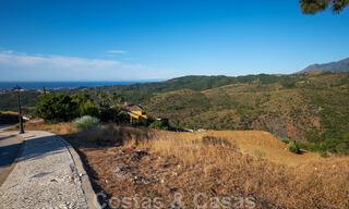 Building plots for sale with panoramic sea and mountain views on a luxury estate in Marbella - Benahavis 32272 
