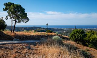 Building plots for sale with panoramic sea and mountain views on a luxury estate in Marbella - Benahavis 32276 
