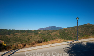 Building plots for sale with panoramic sea and mountain views on a luxury estate in Marbella - Benahavis 32278 