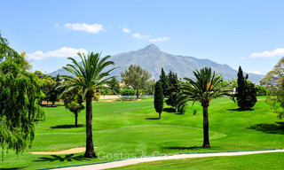 Spacious luxury penthouse with panoramic views for sale on a golf course in Nueva Andalucia, Marbella 32099 