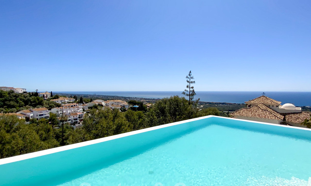 Move in ready! New modern style villa for sale with stunning open sea views in Marbella, close to the beaches and centre 32136
