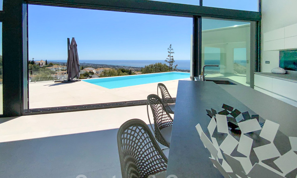 Move in ready! New modern style villa for sale with stunning open sea views in Marbella, close to the beaches and centre 32144