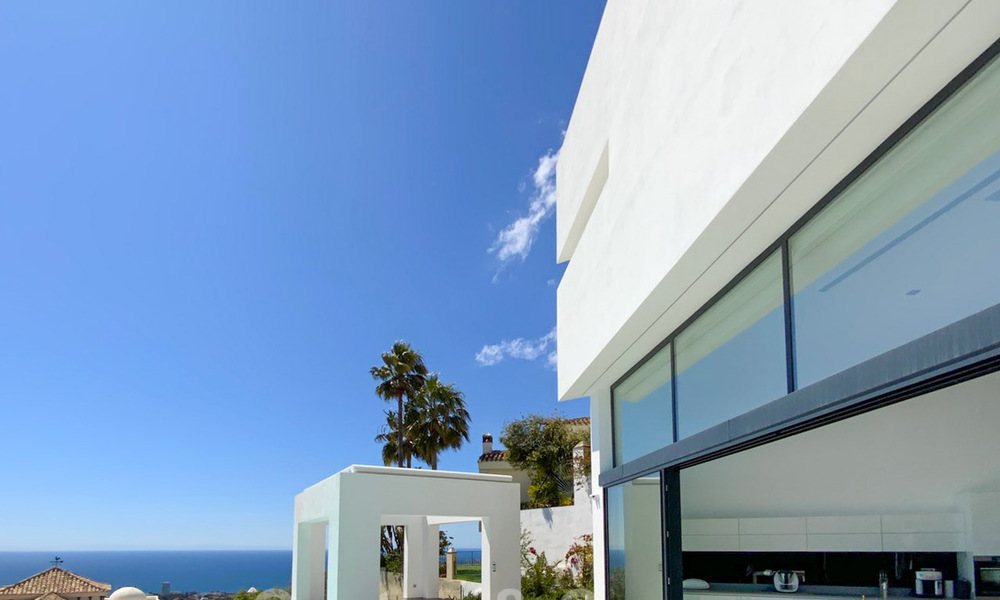 Move in ready! New modern style villa for sale with stunning open sea views in Marbella, close to the beaches and centre 32146