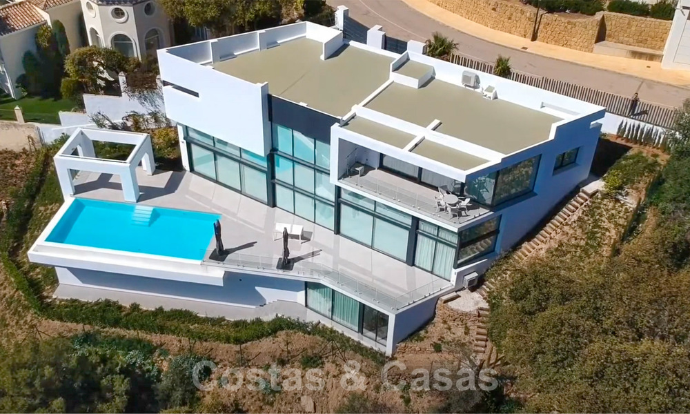 Move in ready! New modern style villa for sale with stunning open sea views in Marbella, close to the beaches and centre 32314