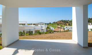 Modern 3-bedroom apartment for sale with partial sea view in a front-line golf complex in Benahavis - Marbella 32530 