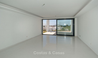 Modern 3-bedroom apartment for sale with partial sea view in a front-line golf complex in Benahavis - Marbella 32536 