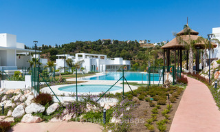 Modern 3-bedroom apartment for sale with partial sea view in a front-line golf complex in Benahavis - Marbella 32546 