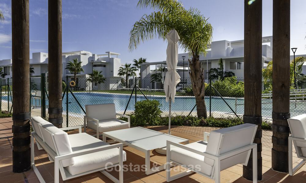 Modern 3-bedroom apartment for sale with partial sea view in a front-line golf complex in Benahavis - Marbella 32559