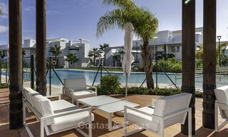 Modern 3-bedroom apartment for sale with partial sea view in a front-line golf complex in Benahavis - Marbella 32559 