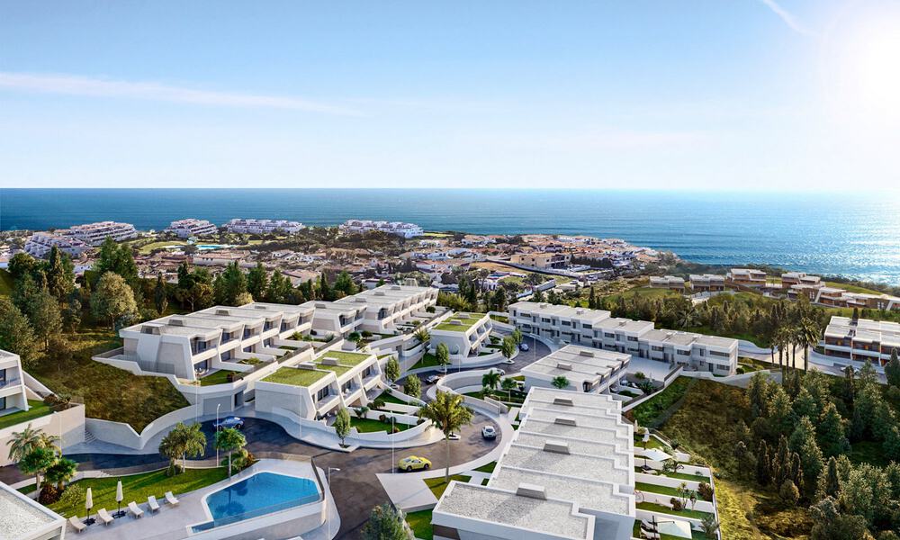 Stunning new avant-garde design terrace houses with sea views for sale in a prestigious golf resort in Mijas Costa, Costa del Sol 32651