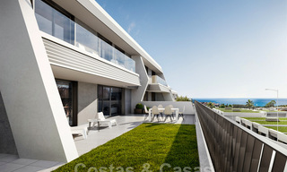 Stunning new avant-garde design terrace houses with sea views for sale in a prestigious golf resort in Mijas Costa, Costa del Sol 32654 