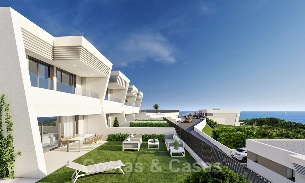 Stunning new avant-garde design terrace houses with sea views for sale in a prestigious golf resort in Mijas Costa, Costa del Sol 32658