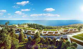 Stunning new avant-garde design terrace houses with sea views for sale in a prestigious golf resort in Mijas Costa, Costa del Sol 32663 