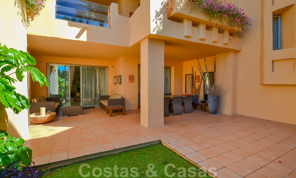 Spacious luxury flat with a generous terrace and garden for sale in prestigious development on the Golden Mile in Marbella 32749