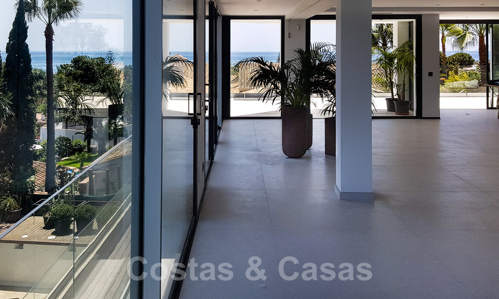 Move in ready, renovated contemporary beachside villa with panoramic sea views for sale in East Marbella 32771