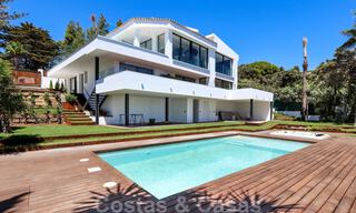 Move in ready, renovated contemporary beachside villa with panoramic sea views for sale in East Marbella 32780 