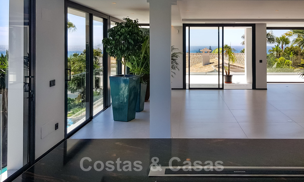 Move in ready, renovated contemporary beachside villa with panoramic sea views for sale in East Marbella 32786