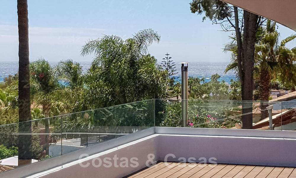 Move in ready, renovated contemporary beachside villa with panoramic sea views for sale in East Marbella 32788