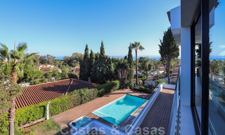 Move in ready, renovated contemporary beachside villa with panoramic sea views for sale in East Marbella 32793 