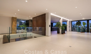 Move in ready, renovated contemporary beachside villa with panoramic sea views for sale in East Marbella 32794 