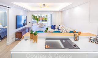 Stunning contemporary refurbished south facing luxury garden flat for sale in Nueva Andalucia, Marbella 32853 