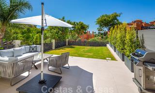 Stunning contemporary refurbished south facing luxury garden flat for sale in Nueva Andalucia, Marbella 32867 