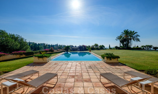 Luxury villa for sale in a classic Mediterranean style with lovely sea views in a gated community on the Golden Mile, Marbella 32996 
