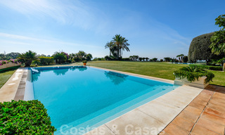 Luxury villa for sale in a classic Mediterranean style with lovely sea views in a gated community on the Golden Mile, Marbella 32998 