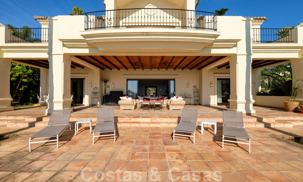 Luxury villa for sale in a classic Mediterranean style with lovely sea views in a gated community on the Golden Mile, Marbella 32999