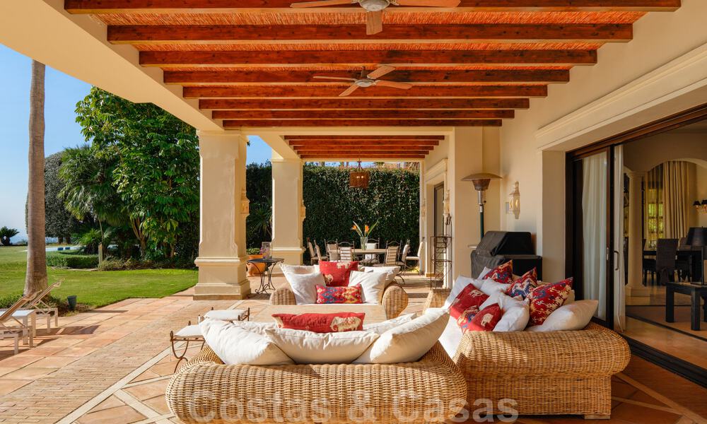 Luxury villa for sale in a classic Mediterranean style with lovely sea views in a gated community on the Golden Mile, Marbella 33000