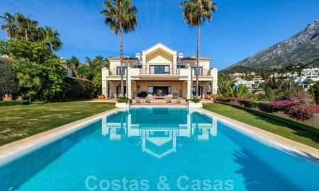 Luxury villa for sale in a classic Mediterranean style with lovely sea views in a gated community on the Golden Mile, Marbella 33003