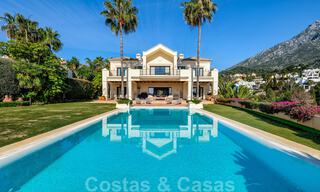 Luxury villa for sale in a classic Mediterranean style with lovely sea views in a gated community on the Golden Mile, Marbella 33003 
