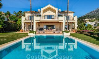 Luxury villa for sale in a classic Mediterranean style with lovely sea views in a gated community on the Golden Mile, Marbella 33004 