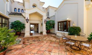 Luxury villa for sale in a classic Mediterranean style with lovely sea views in a gated community on the Golden Mile, Marbella 33011 