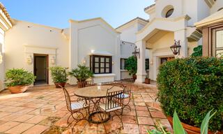 Luxury villa for sale in a classic Mediterranean style with lovely sea views in a gated community on the Golden Mile, Marbella 33013 