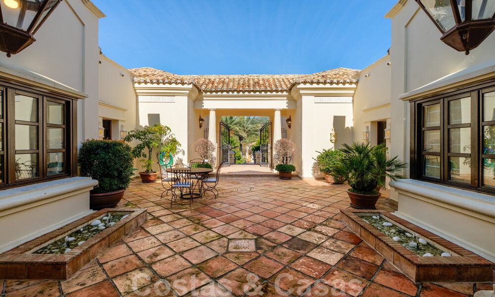 Luxury villa for sale in a classic Mediterranean style with lovely sea views in a gated community on the Golden Mile, Marbella 33014